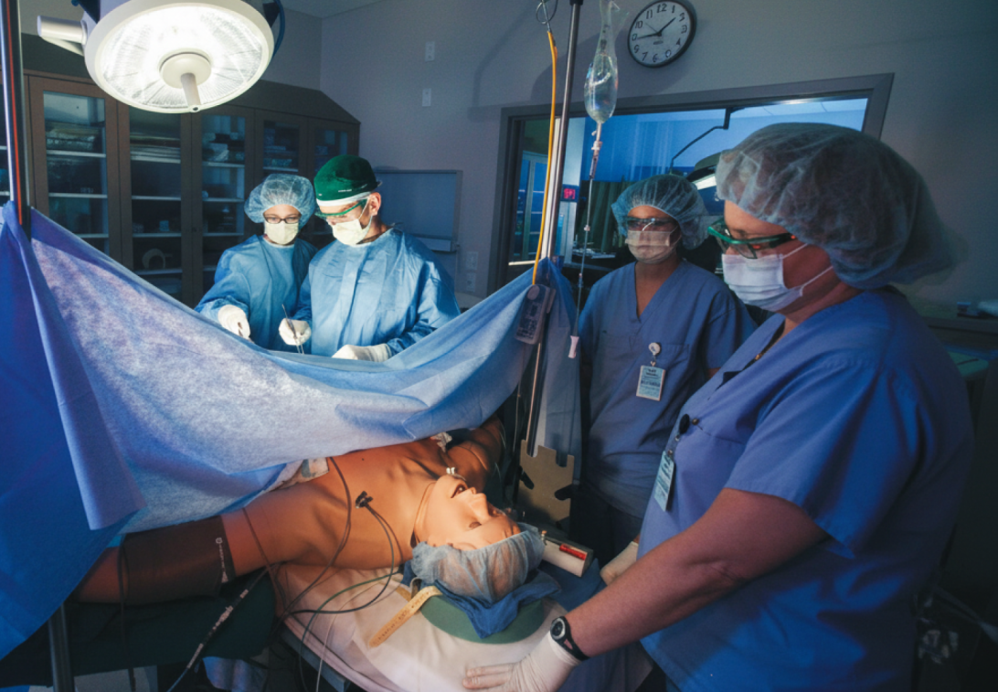 Nursing students in a simulation lab setting.